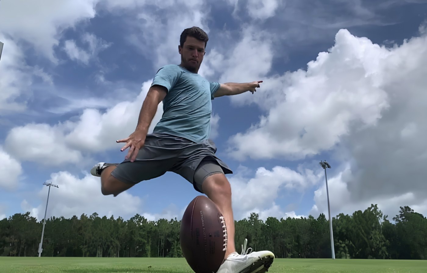 Cairo Santos kicking during a 4th Down University training session
