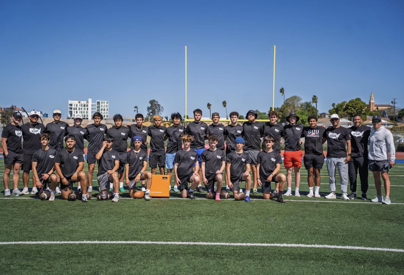The Tour camp group with Coach Dan Lundy and staff