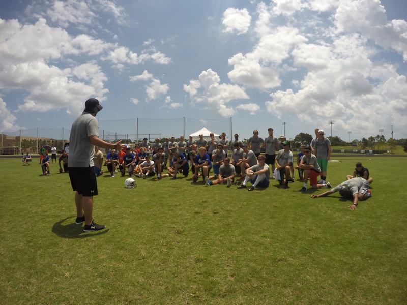 Coach addressing a clinic group