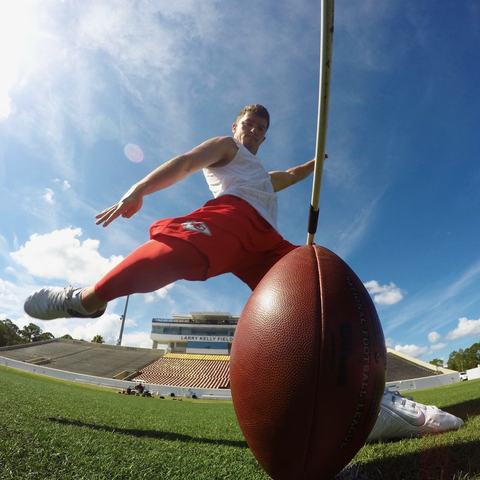 Cairo Santos, ball-level view of a field goal at Municipal Stadium